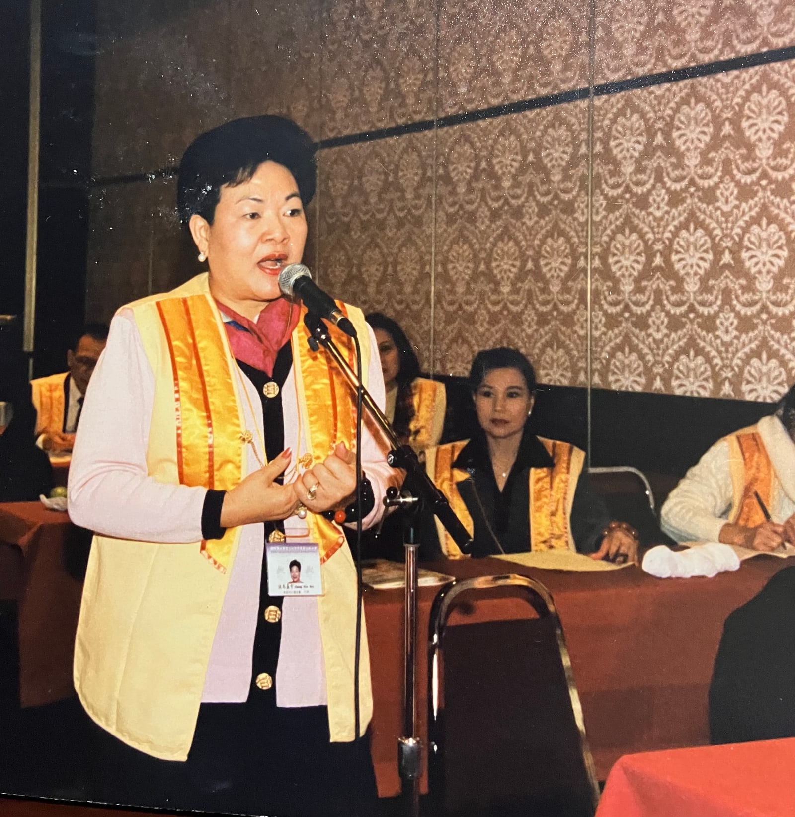 Addressing a Buddha's Light International Association meeting