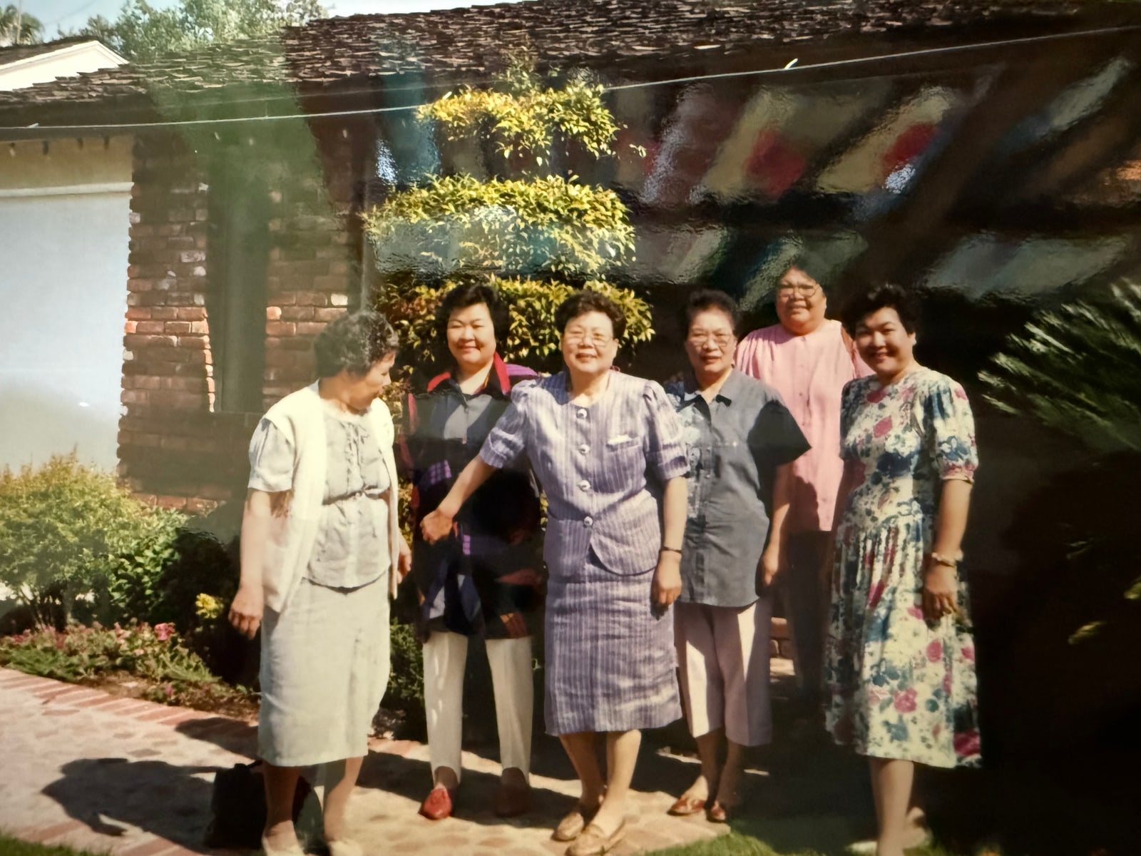 With friends outside a house