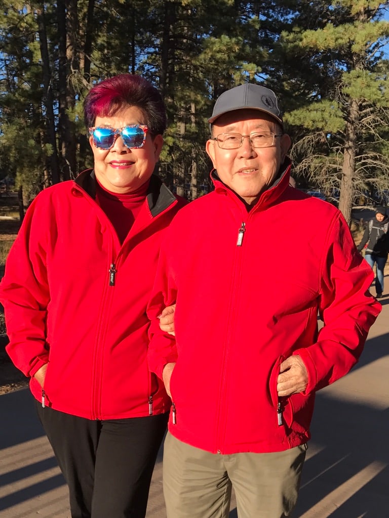 In matching red jackets