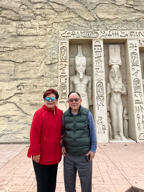Before Egyptian-style statues