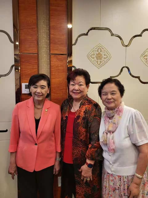 With two guests at a banquet