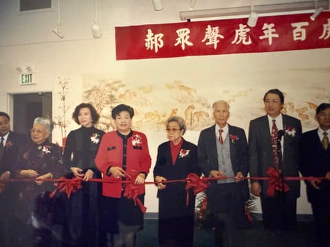 Cutting the ribbon at a Year of the Tiger exhibit